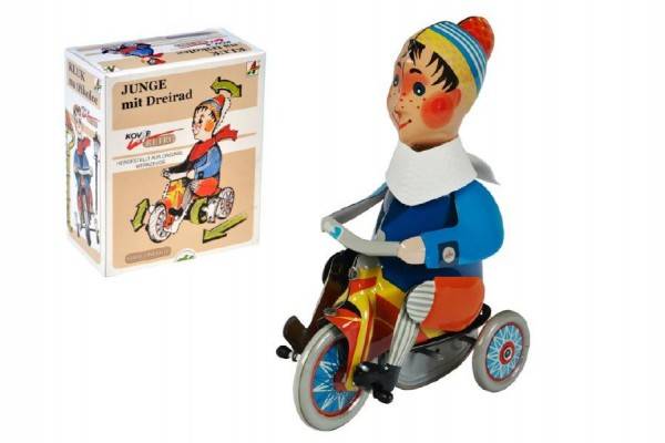 Chlapec na trojkolke na kľúčik kov 15cm v krabici Kovap